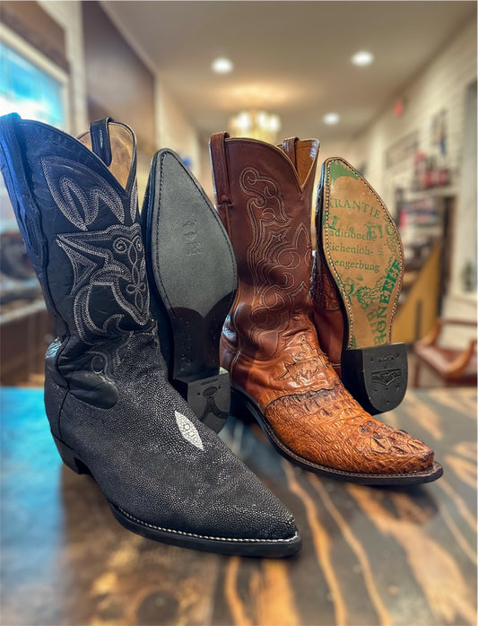2 pairs of exotic leather skin cowboy boots resoled with new leather soles and rubber heels