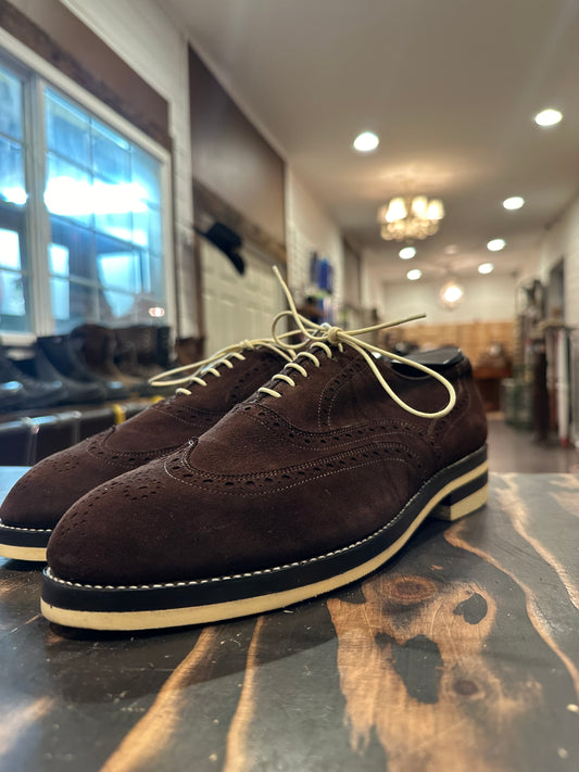 A pair of brown suede wingtip Allen Edmonds dress shoes repaired with Dr Sole cream Full Soles and Heels at the dress shoe repair center