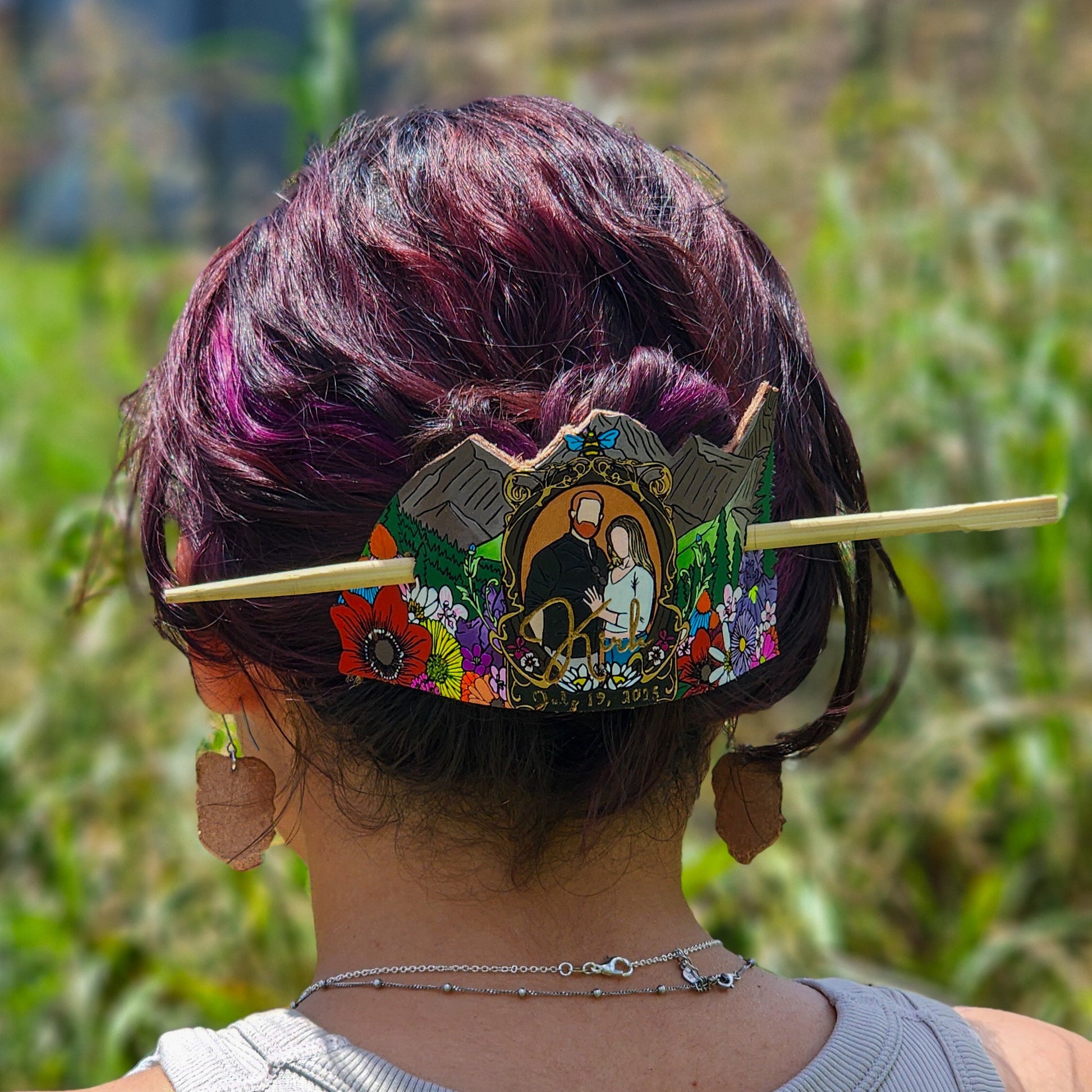 Person with colorful hair accessory in a natural setting