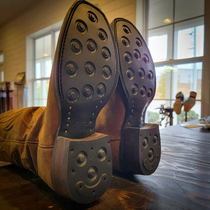 A pair of square toe Thursday Boot Cowboy Boots after being repaired with new Dainite Soles and Heels at the Cowboy Boot Repair Center