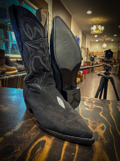 a pair of stingray skin cowboy boots repaired with new JR leather soles and rubber heels at the cowboy boot repair center