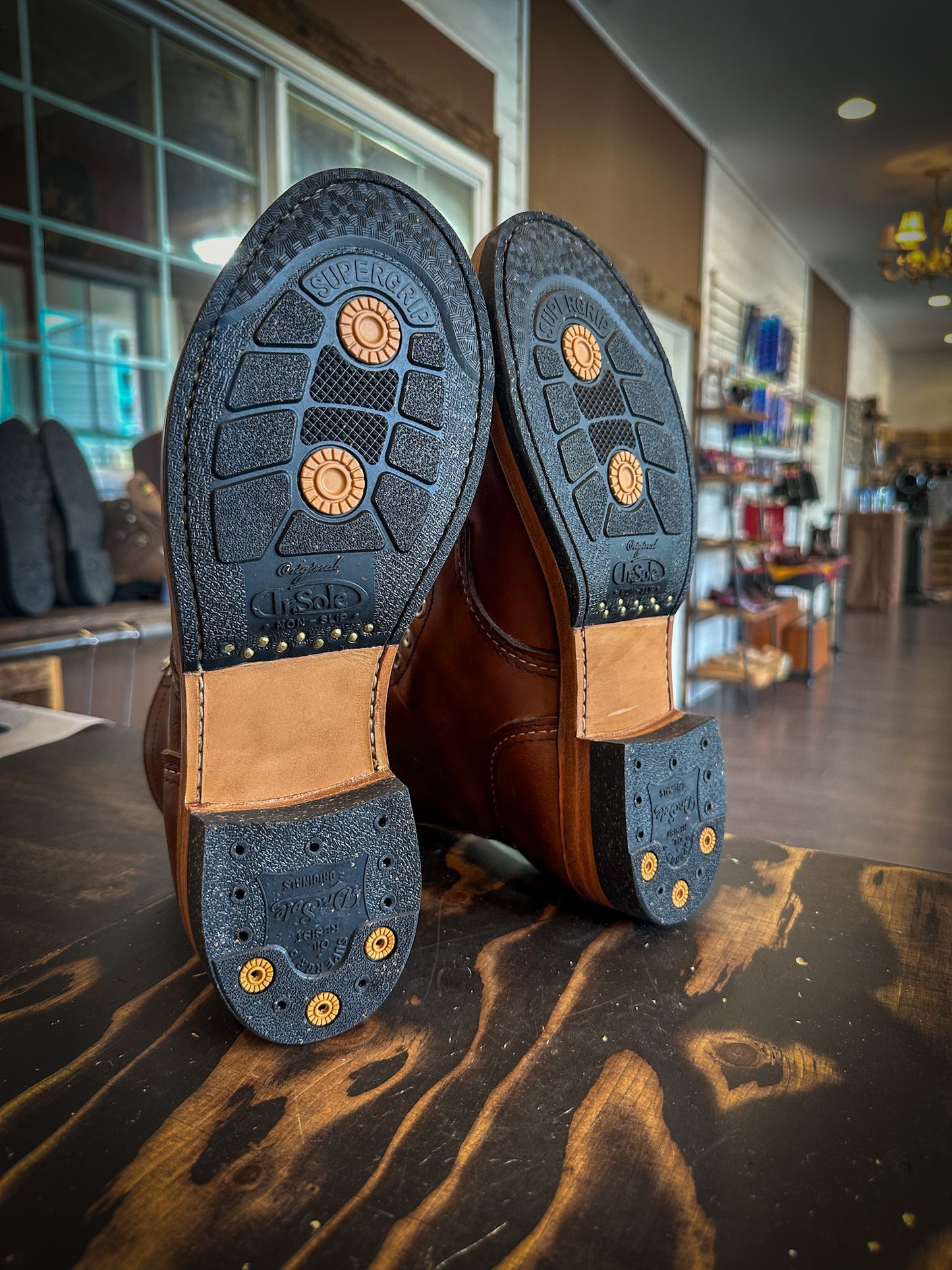 A pair of Redwing Iron Rangers repaired with new black DR Sole Half Soles and Heels at the boot repair center