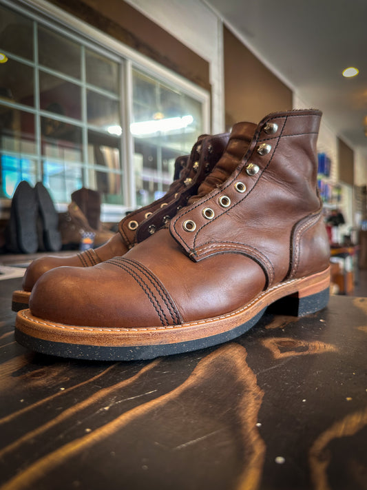 A pair of Redwing Iron Rangers repaired with new Black DR Sole Half Soles and Heels at the boot repair center