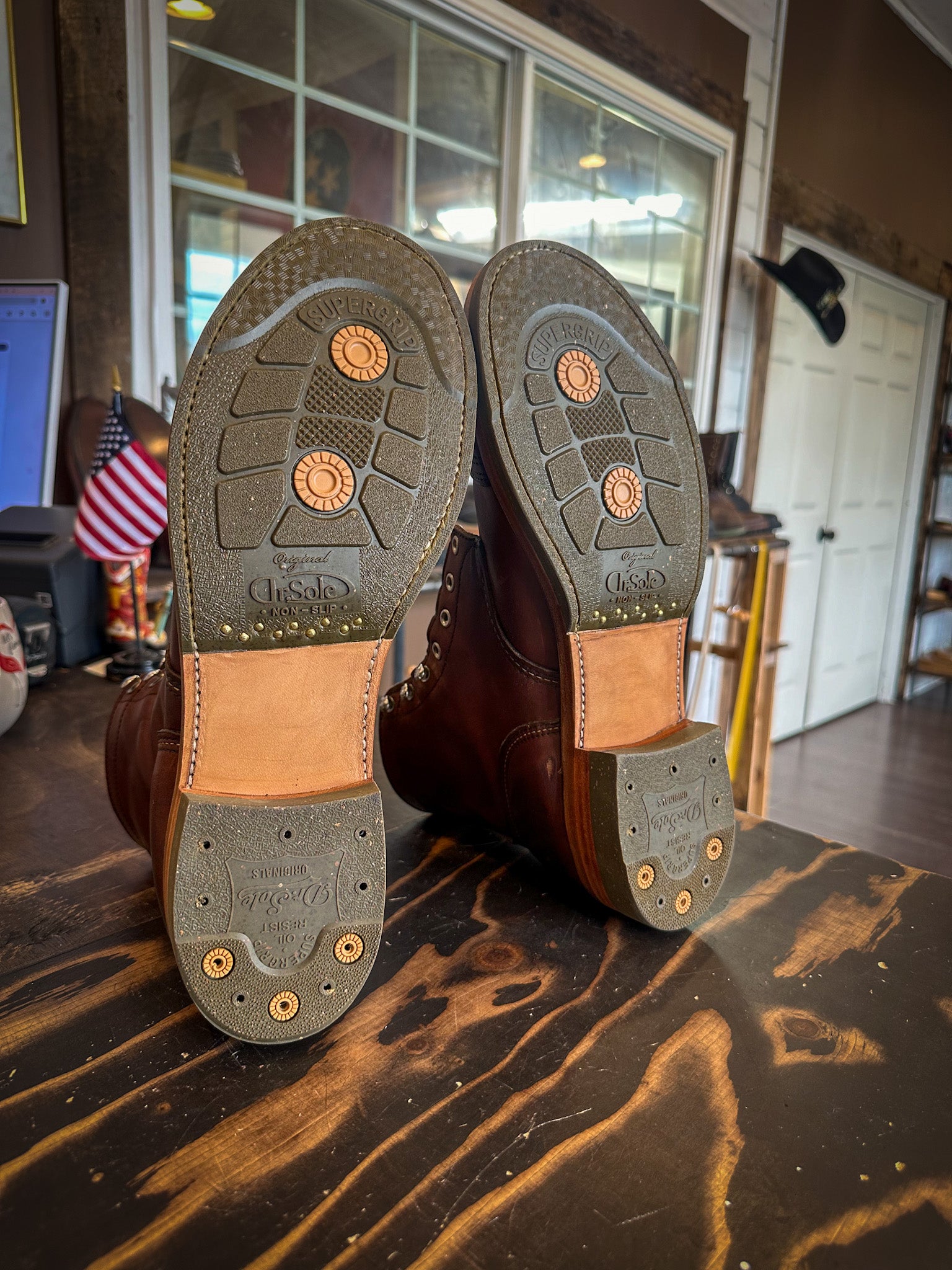 A pair of Redwing Iron Ranger Repaired with new DR sole Half soles and Heels at the boot repair center