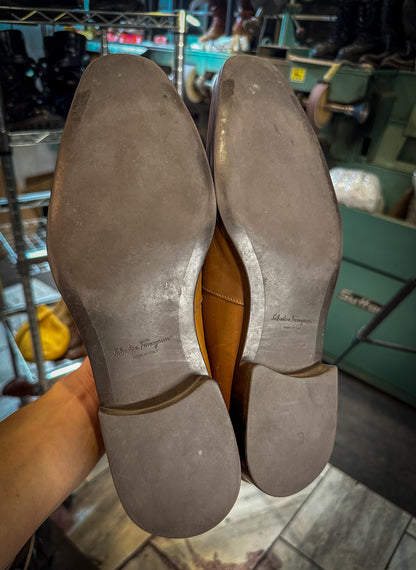 a pair of Ferragamo dress shoes before being repaired with new Vibram 700 soles and heels at the dress shoe repair center