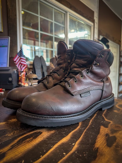 A pair of Redwing work boots after being repaired with new Vibram Long Haul Soles at the Boot Repair Center